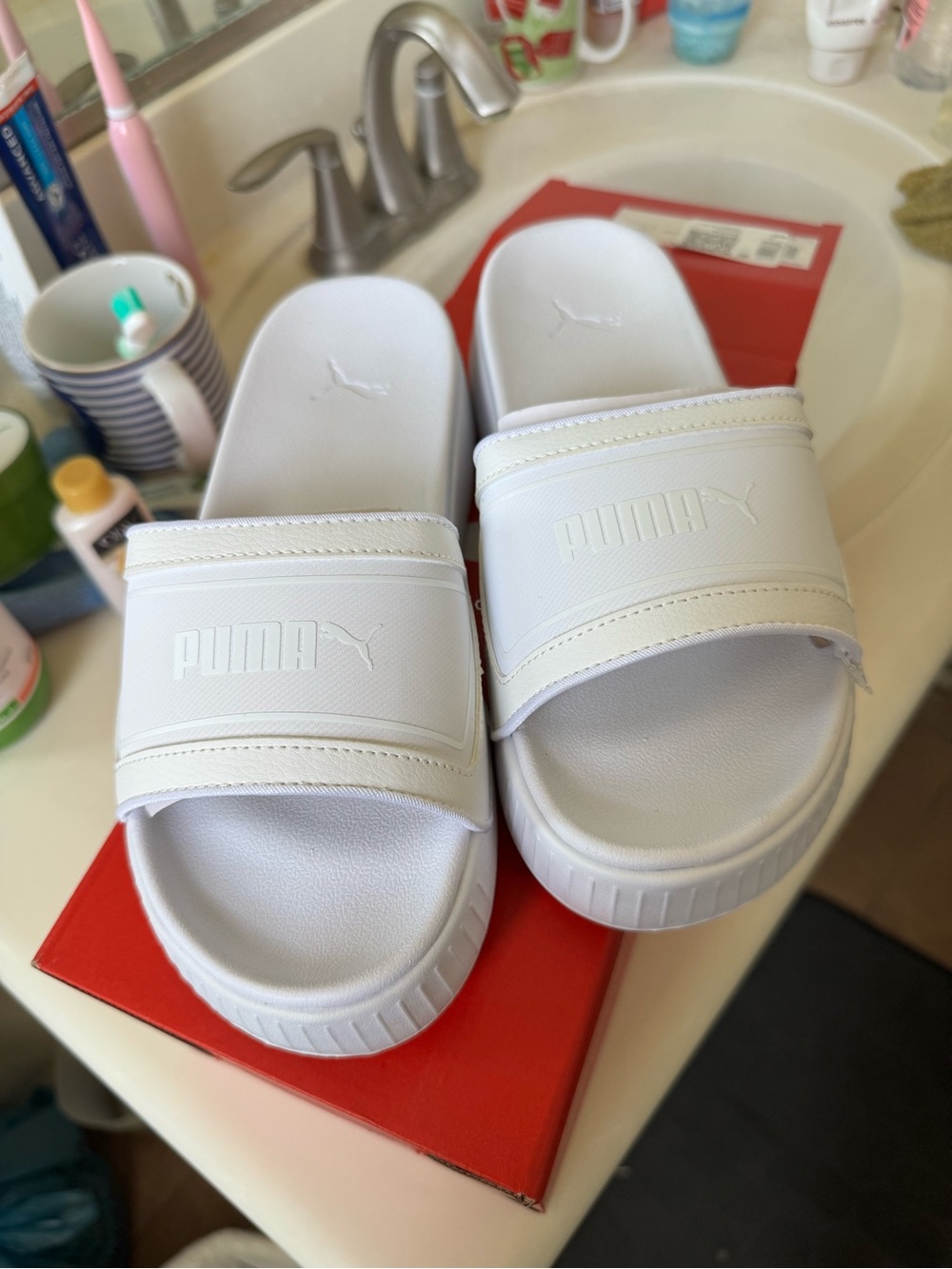 Puma White Slide Sandals with Embossed Logo